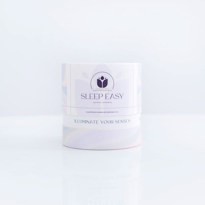 Sweet Dreams coconut soy candle, a tube box with company logo and brand texture is displayed on a white background.  Hand poured coconut soy candles. Handmade in Oshawa, Ontario. Luxury candles Canada. Scented candles Canada. Luxury Scented candles. Free Canadian shipping on orders over $99.99. floral scented candle. fruity scented candle.